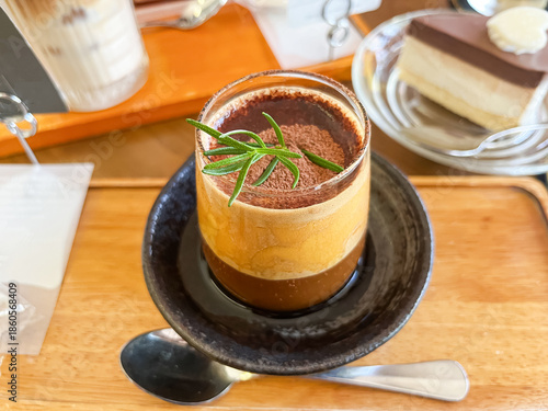 Vietnamese Egg Coffee Dessert with Rosemary Garnish