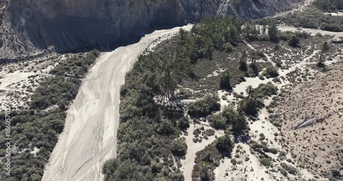 Aerial detail of dry desert river curve and vegetation highlighting water scarcity in the Tabernas Desert of Andalusia Spain, commercial grading