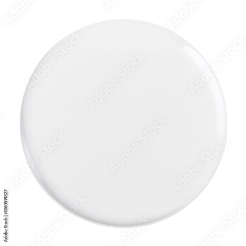 Round White Object Placed on a Flat Surface in a Bright Room at Midday