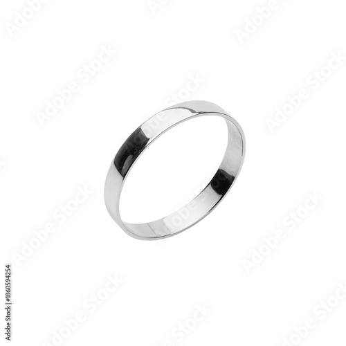 Silver Ring Placed on a Flat Surface Showing a Simple Design With No Stones o...