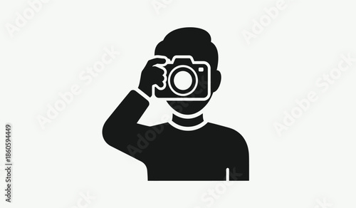 A minimalist depiction of a photographer taking a picture with a camera