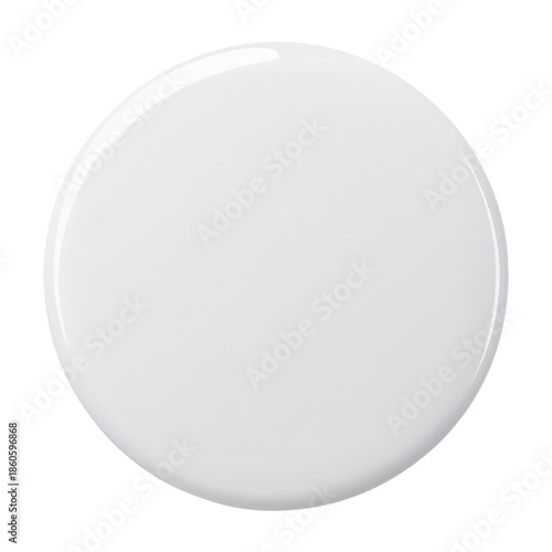 Round White Object Placed on a Flat Surface in a Bright Room at Midday