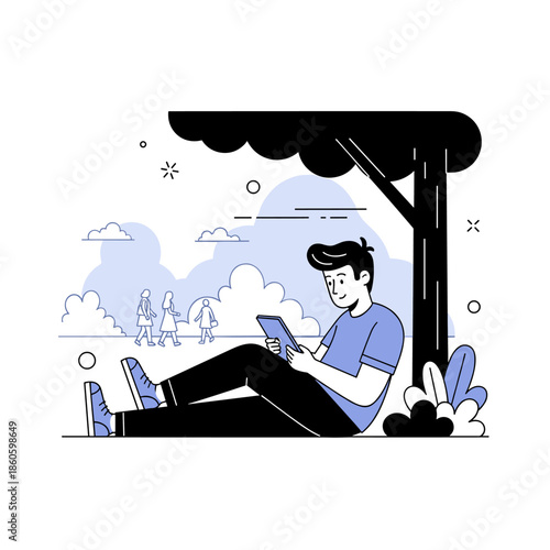 Young caucasian male enjoying digital tablet under tree outdoors