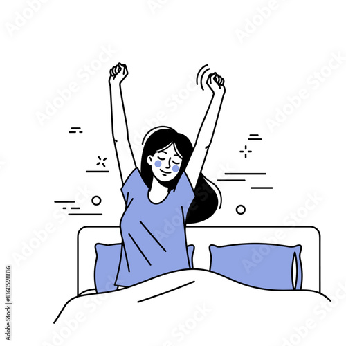 Young female waking up and stretching in bed with blissful expression