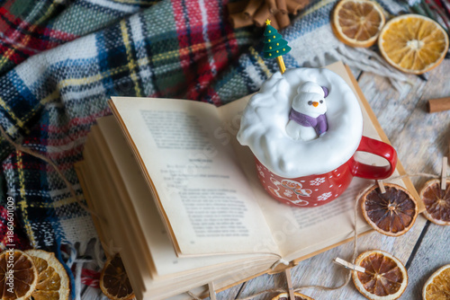 New Year's treats on the table and the symbol of the new 2026: a horse, tea, coffee, gingerbread and zephyr.