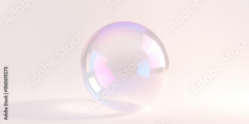 A large iridescent glass sphere reflecting light and creating a subtle shadow on a soft pink background in a minimalist setting