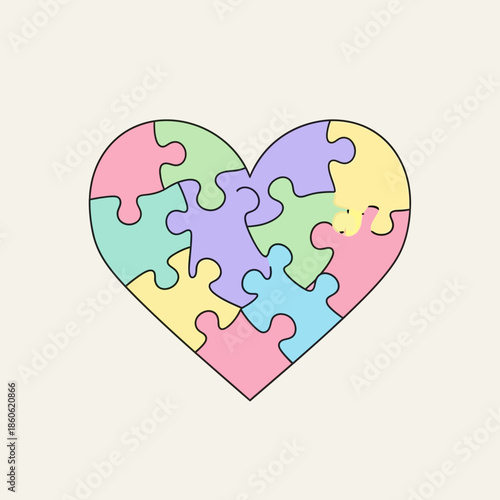 Heart shaped puzzle pieces forming a whole symbol.