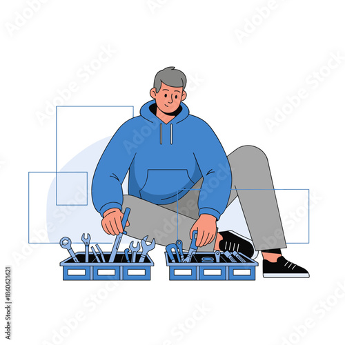 Caucasian male mechanic selecting tools from organizer box