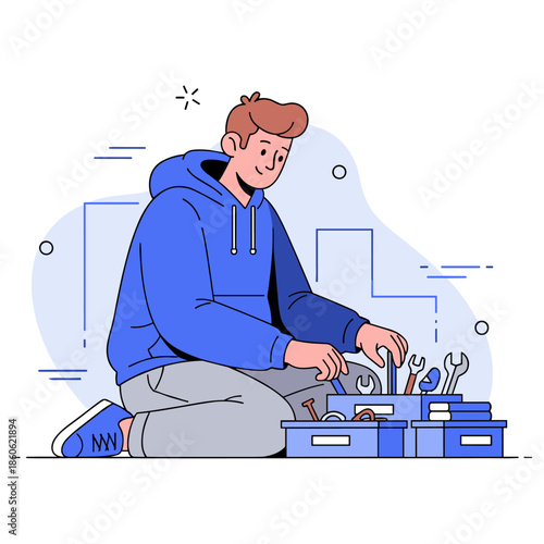 Young caucasian male organizing tools in workshop