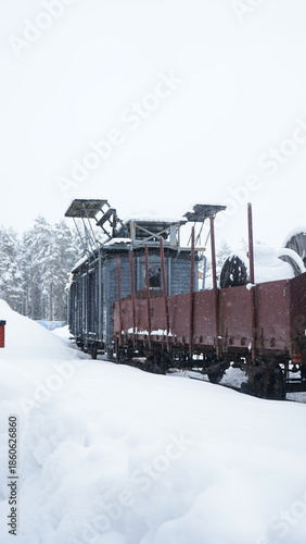 Vintage train wagons covered by snow