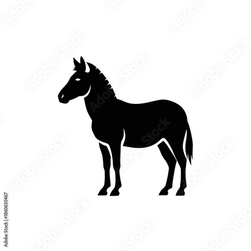 Black silhouette of a donkey standing.