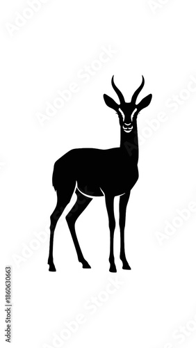 Black silhouette of an antelope standing.