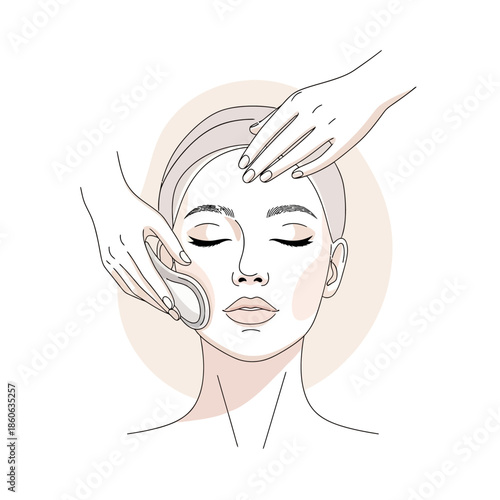 Woman receiving facial massage treatment.