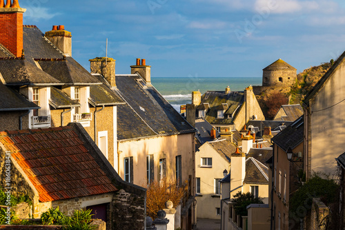 Vauban Tower overlooking the sea and the fishing village of Port-en-Bessin