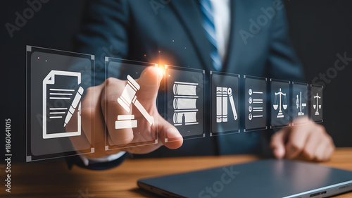 Online legal services and e-court concept with businessman touching virtual icons for law gavel and scales of justice.png