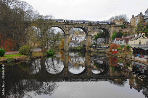 A train crossing the railway viaduct across the River Nidd at Knaresborough, North Yorkshire, England, UK