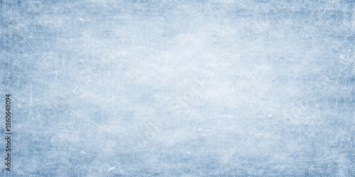 A bright blue grunge abstract background features a frozen winter texture of white snow and icy frost patterns under a cold crystal sky with soft clouds