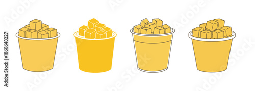 Four cups filled with yellow cubes, possibly representing mango or cheese, against a white background.