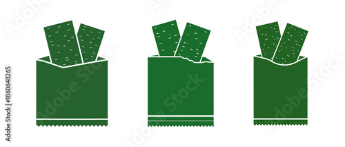 Three green paper bags with two rectangular green crackers sticking out of each bag.