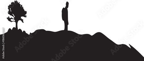 Silhouette hiker on mountain peak