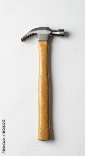A standard claw hammer with a wooden handle rests horizontally on a clean, bright white studio background, emphasizing its sturdy utility and construction use ,carpentry, utility, handle