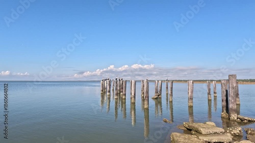 A small coastal settlement in Alabama, located on a bay on the Gulf Coast near Mobile Bay.