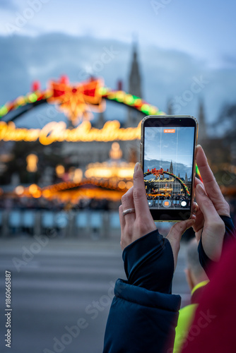 Photography Woman Hand Holding Smartphone Taking Photo of Vienna Rathaus Christmas Market Us