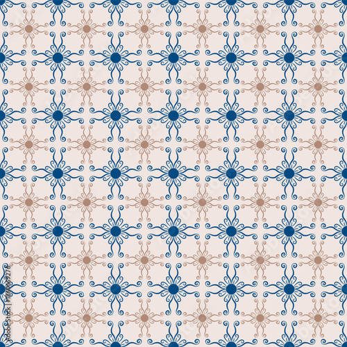 Ornate seamless pattern with blue and beige decorative tile motifs. Symmetric...