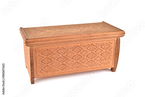 Handcrafted vintage carved wooden box isolated on the white background. Selective focus. 
