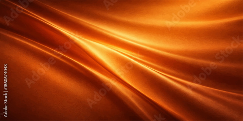 Luxurious golden silk background with a smooth satin texture featuring flowing liquid waves and soft light patterns on a gold fabric textile backdrop