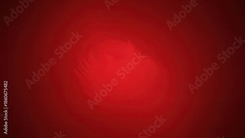 Red feather on dark red background with soft lighting Romantic Valentine?s Day Love Abstract