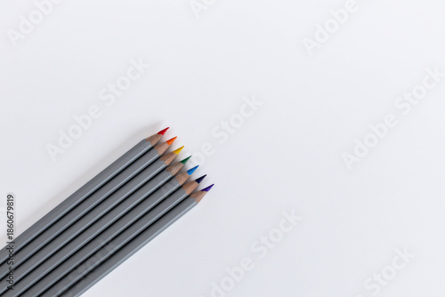 colored pencils on a white background