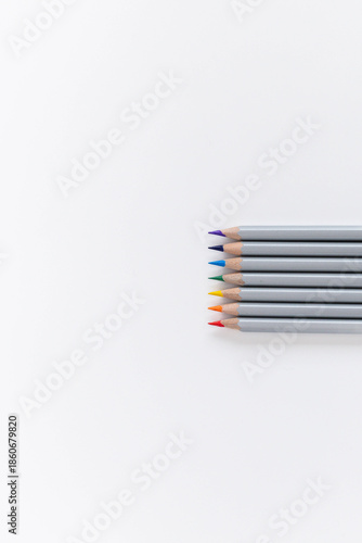 colored pencils on a white background