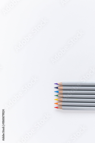 colored pencils on a white background
