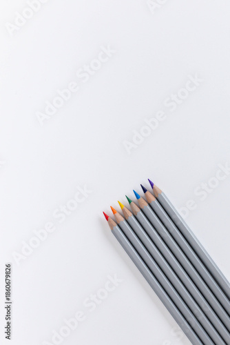 colored pencils on a white background