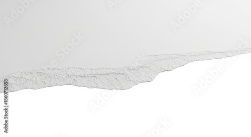 Clean white paper with a rough, jagged torn edge creating an abstract minimalist background for copy space, graphic design, and artistic presentation with bright, pristine clarity