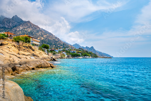 Wallpaper Mural Karkinagri village small town townscape houses mountains cliff on Ikaria, Greece longevity blue zone Aegean island on Icarian sea Torontodigital.ca
