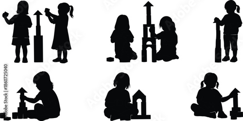 Black silhouettes of children building with blocks playing