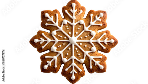 Overhead shot of a festive, gingerbread snowflake cookie with white icing on a black background