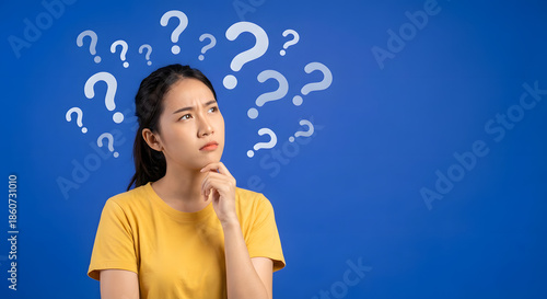 Wallpaper Mural thinking woman with question marks around head Torontodigital.ca