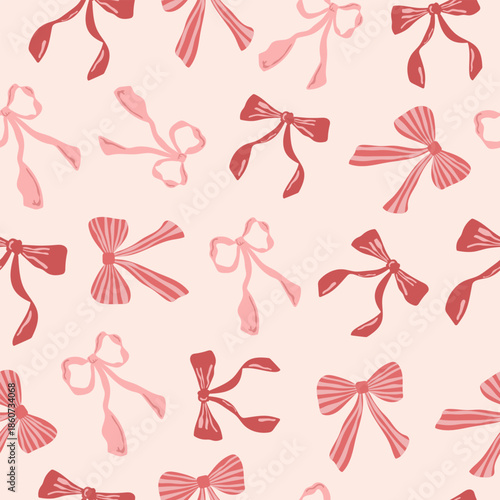 A cute seamless pattern with pink and red bows. Festive background illustration for Valentine's Day, greeting cards, or gift wrapping paper.