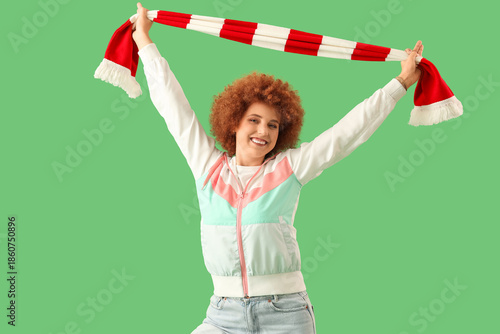 Female soccer fan with scar...