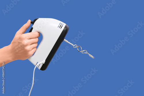 Female hand with electric m...