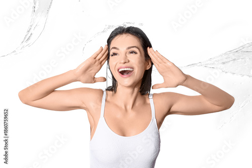 Happy young woman with wate...