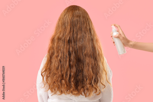 Young redhead woman and han...