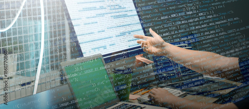 Male programmer pointing at...