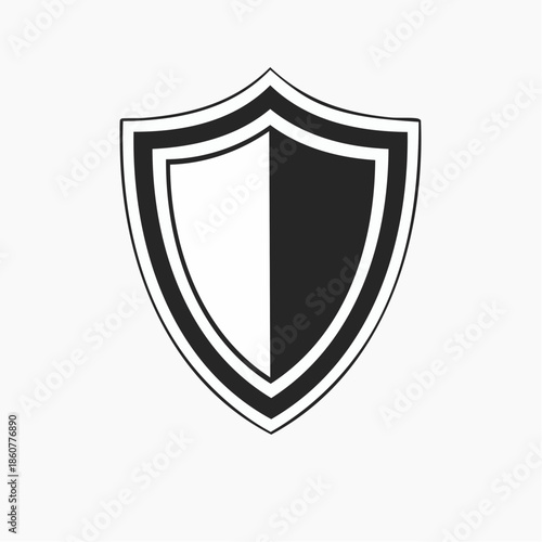 A black and white shield icon on a plain background viewed from the front
