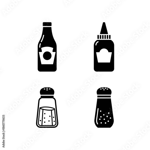 Set of four condiment bottles and shakers in black and white.
