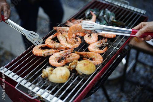 Grilled shrimp and grilled squid on the stove, Street food, Thailand