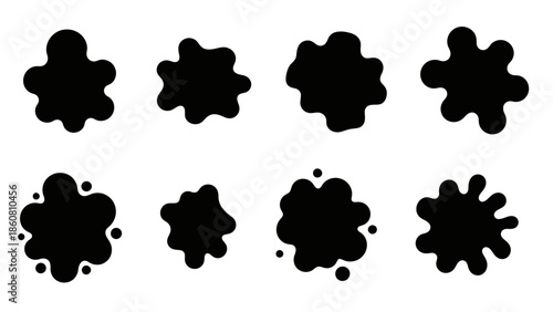 Collection of eight distinct black ink splatters isolated on a white background